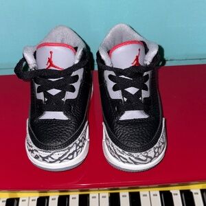 Jordan Kids Black and White Sneakers with Red Accents